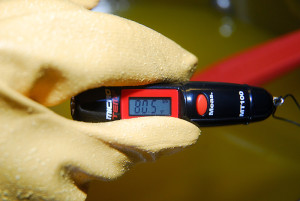 A small instant read thermometer is very helpful. If you use one with a metal probe, make sure it's stainless steel!