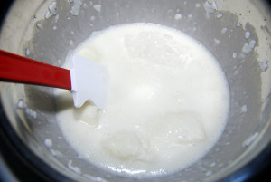 The milk will quickly begin to melt as the lye is added