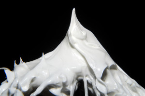 Egg whites beaten to stiff peaks should resist gravity, and still have a glossy appearance