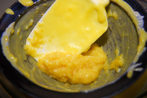 This is why! You want the finished curd to be smooth, and not have these bits of cooked egg, or zest